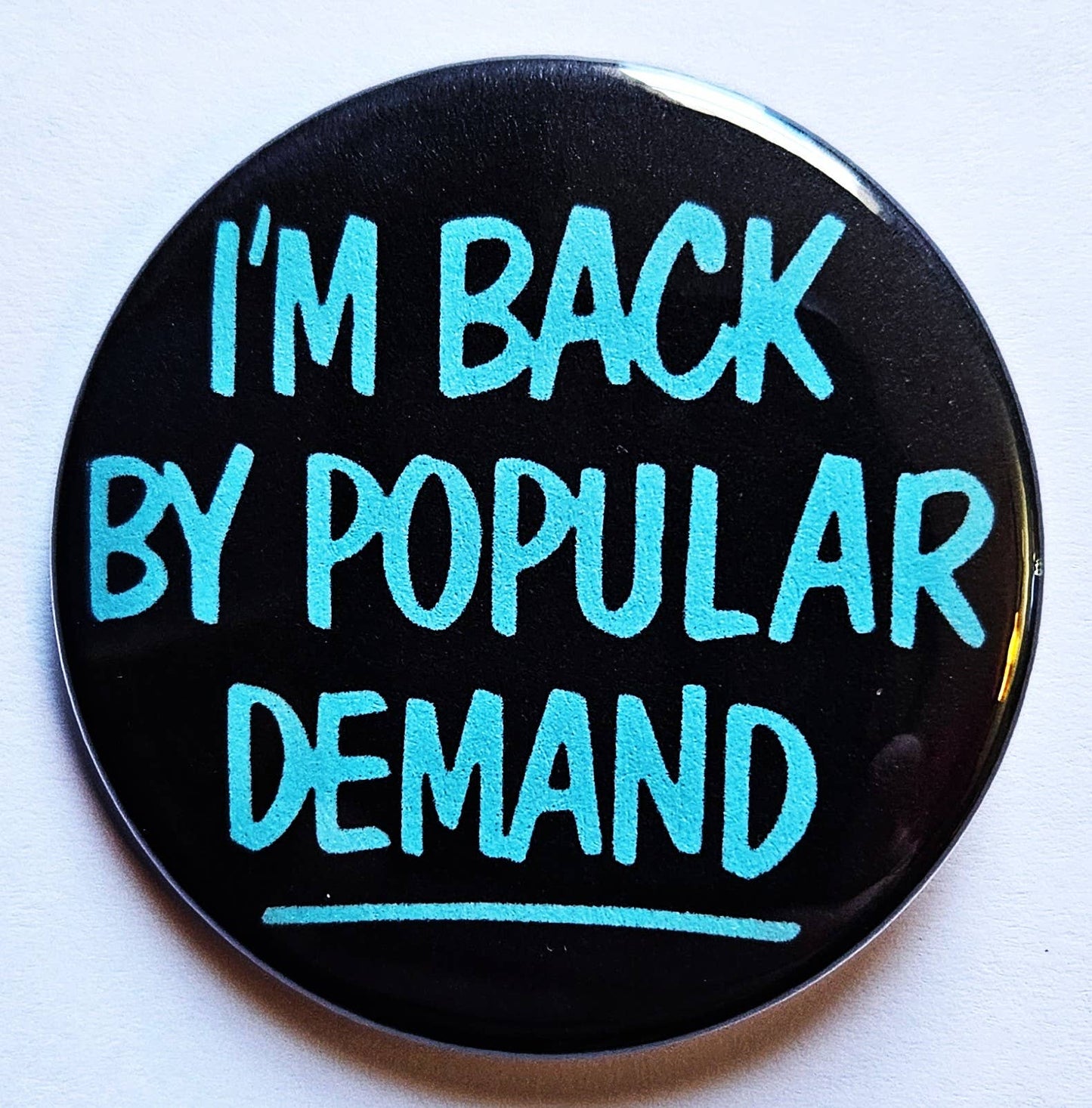 Back By Popular Demand Button Pin